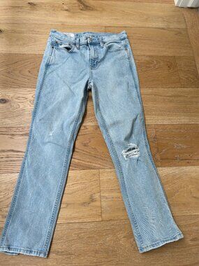 GAP Vintage Slim Mid Rise jeans in a light wash with a flattering slim/straight